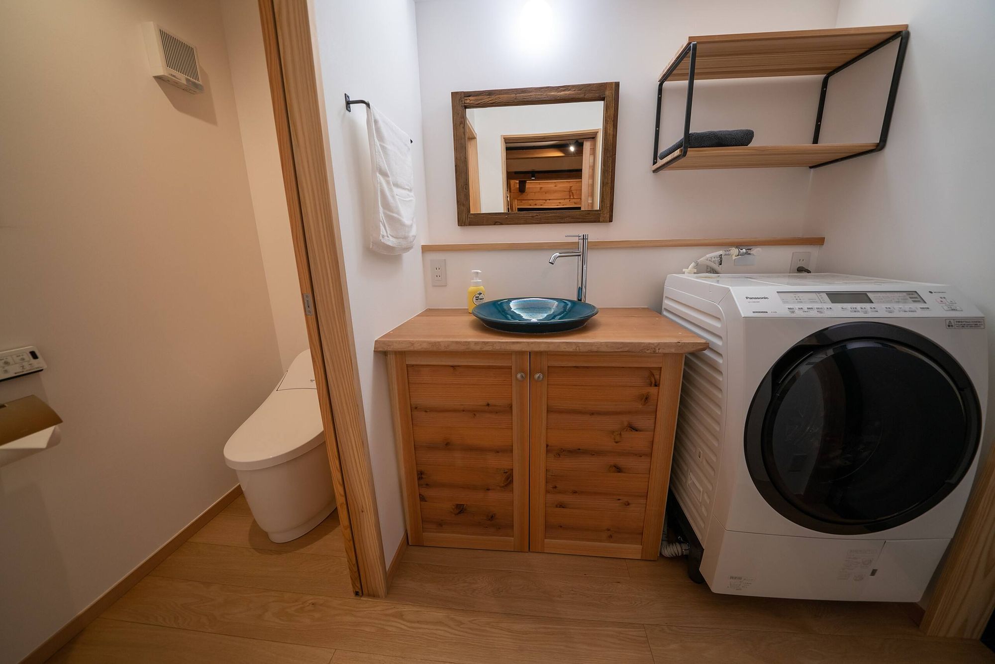 Washbasin, toilet and washer-dryer